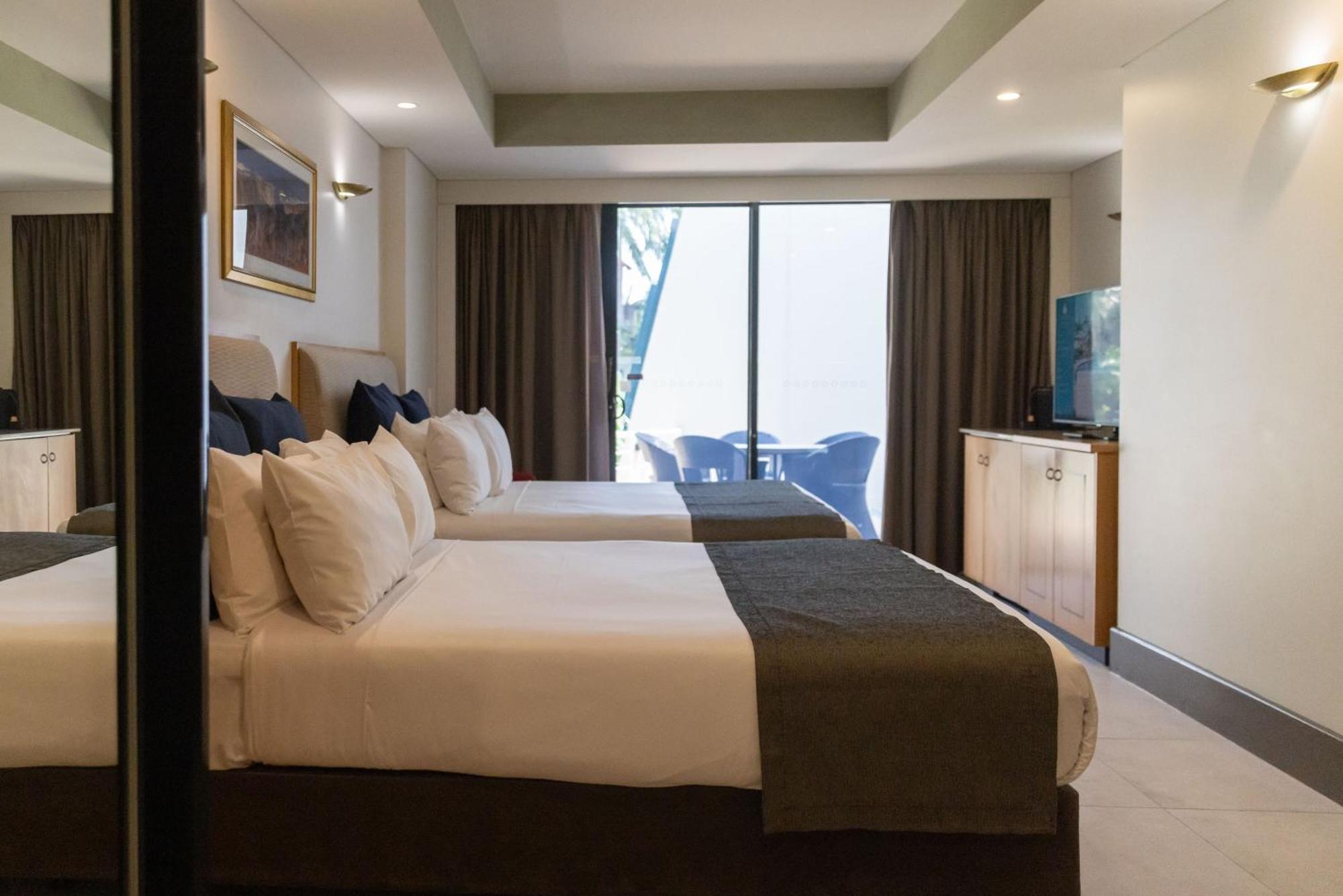 มินดิล บีช กาสิโน แอนด์ รีสอร์ต Hotel ดาร์วิน ภายนอก รูปภาพ A room at the hotel